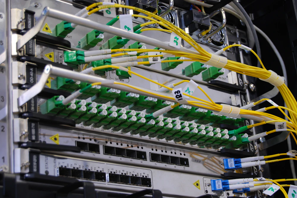 Fiber termination and PoE switch network backbone supporting IP camera deployment