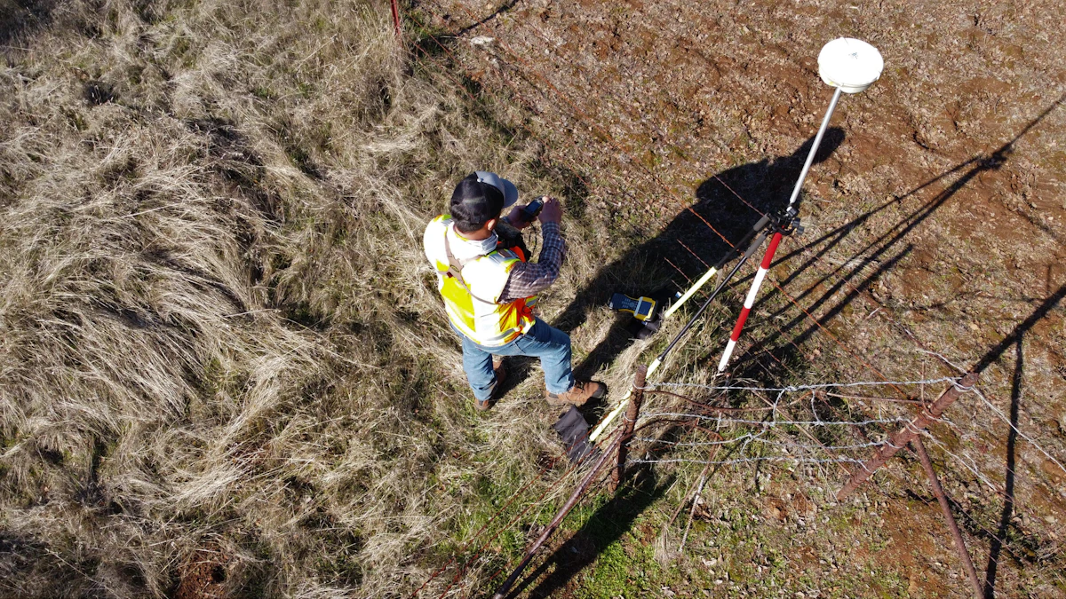 Building telecommunications infrastructure with riser conduit, backbone cable, and terminated telecom room hardware