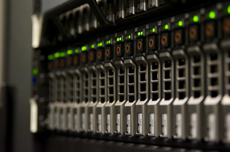 Network server rack with active status lights indicating monitored infrastructure