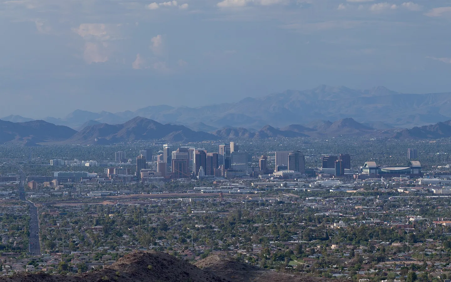 Downtown Phoenix skyline with desert mountains in the distance