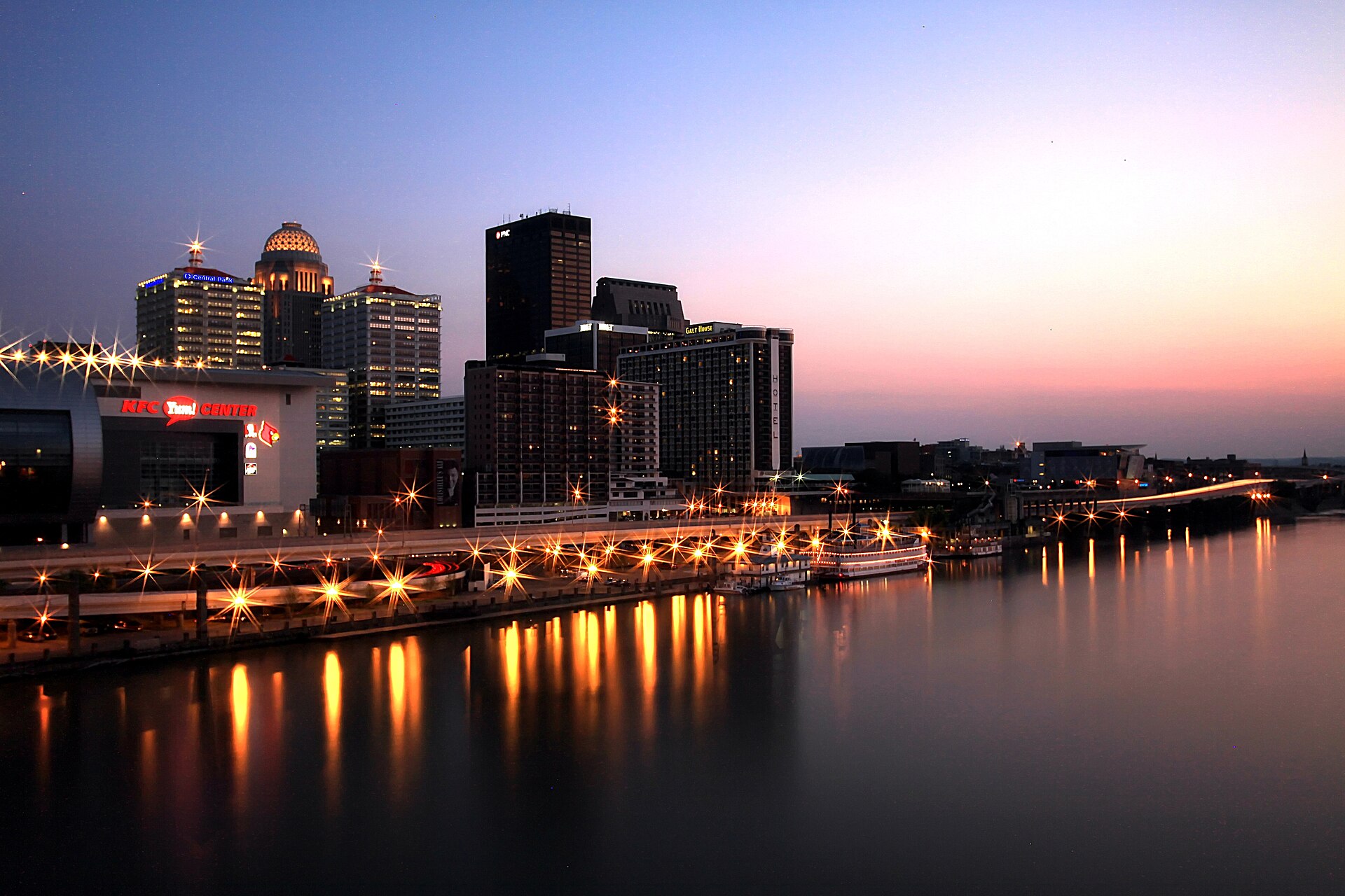 Downtown Louisville, Kentucky skyline at dusk reflected in the Ohio River