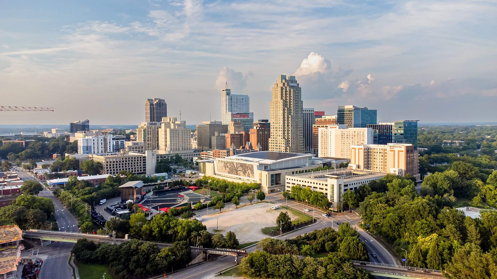 Aerial drone view of downtown Raleigh, North Carolina skyline from Dorothea Dix Park