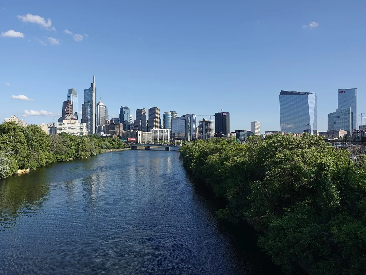 Downtown Philadelphia skyline with the city's commercial towers under daytime sky